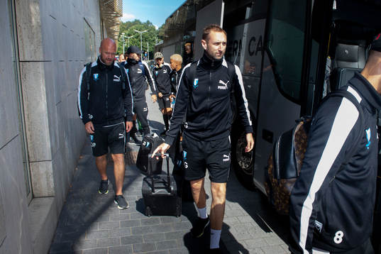 Assistant coach Olof Persson and assistant coach Andreas Georgson of Malmö FF arrives at the hotel ahead of the Europa League match against Genk on September 19, 2018 in Genk.