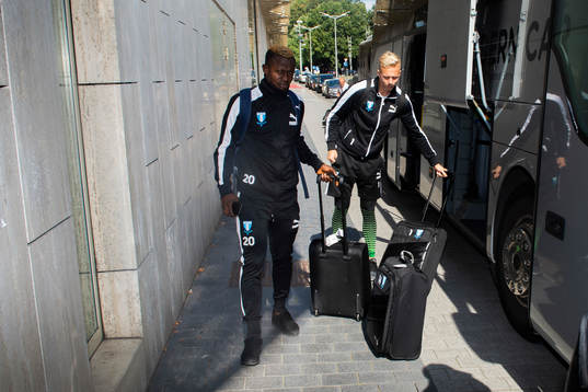 Bonke Innocent and goalkeeper Walter Viitala of Malmö FF arrives at the hotel ahead of the Europa League match against Genk on September 19, 2018 in Genk.