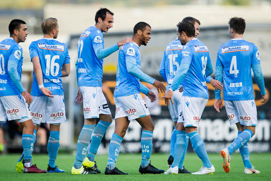 Erixon Danso of Sandnes Ulf celebrates with his teammates after scoring 0-2