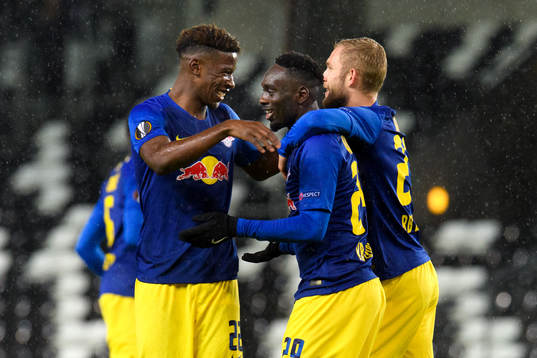Nordi Mukiele, Jean-Kevin Augustin and and Konrad Laimer of RB Leipzig celebrates the 0-1 goal during the Europa League match between Rosenborg and RB Leipzig on October 4, 2018 in Trondheim.
