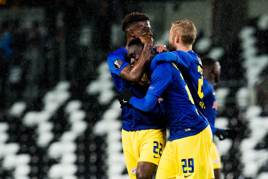 Nordi Mukiele and Jean-Kevin Augustin of RB Leipzig celebrate the 0-1 goal