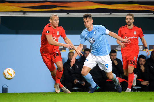 Domagoj Vida and Caner Erkin of Besiktas against Markus