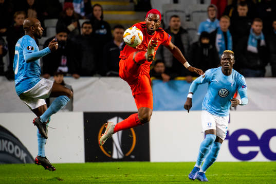 Fouad Bachirou of Malmö FF and Ryan Babel of Besiktas