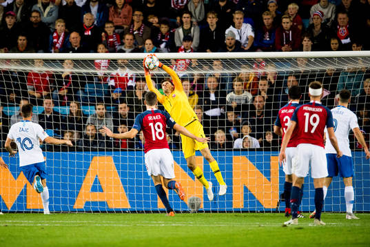 Goalkeeper Rune Almenning Jarstein of Norway with a save