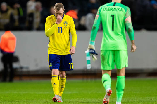 John Guidetti of Sweden looks dejected