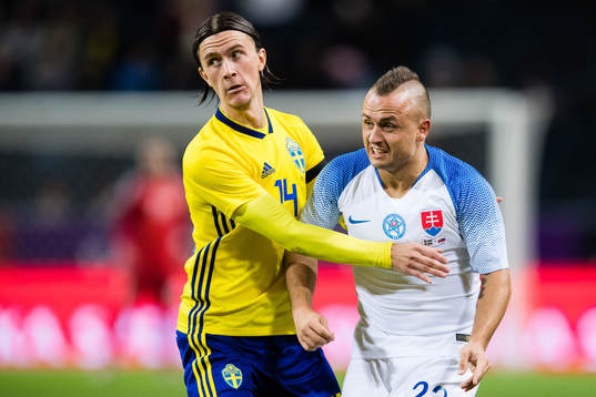Kristoffer Olsson of Sweden and Stanislav Lobotka of