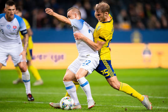 Stanislav Lobotka of Slovakia and Sebastian Andersson of
