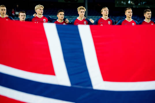 Ulrik Yttergård Jenssen, Tobias Heintz, Tobias Borchgrevink Børkeeiet, Nico Mickelson, Dennis Johnsen, Birk Risa, Leo Skiri Østigård and Vebjørn Hoff of Norway line up ahead of the UEFA European Under-21 Qualifier match between Norway and Azerbaijan on October 16, 2018 in Drammen.