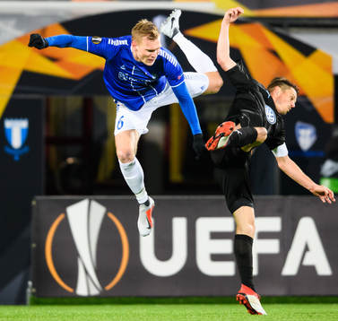 Joonas Tamm of Sarpsborg 08 in action with Markus Rosenberg