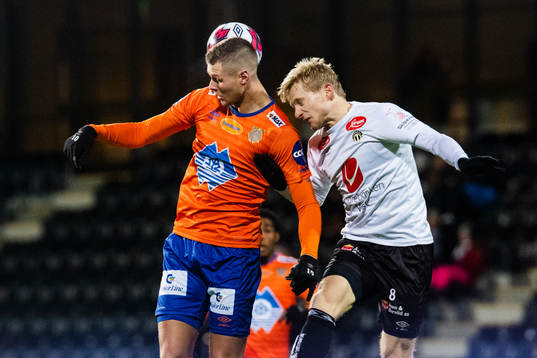 Hólmbert Fridjónsson of Aalesund and Eirik Birkelund of Sogndal competes for the ball
