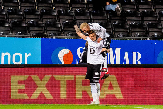 Nicklas Bendtner of Rosenborg celebrates with teammate Birger Meling after scoring 1-1