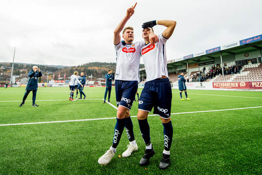 Axel Andresson and Markus Nakkim of Viking celebrate