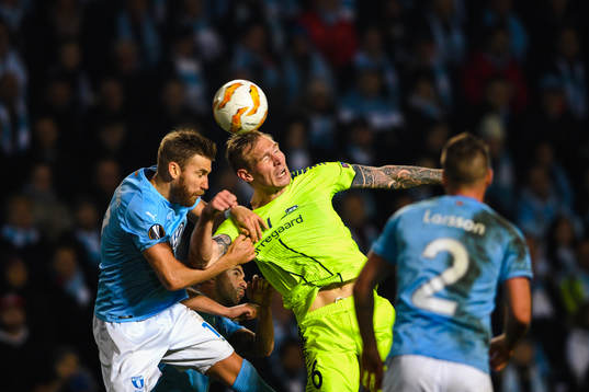Rasmus Bengtsson of Malmö FF and Joonas Tamm of Sarpsborg