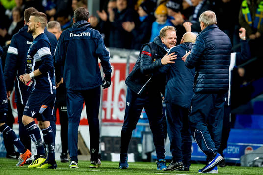 Christian Michelsen, head coach of Kristiansund, celebrates at the final whistle