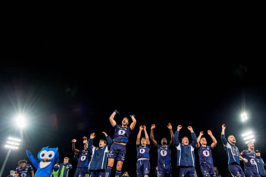 Christoffer Aasbak, Aliou Coly, Flamur Kastrati and the players of Kristiansund celebrate