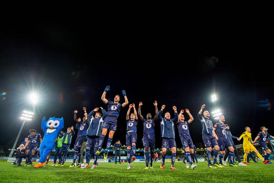 Christoffer Aasbak, Aliou Coly, Flamur Kastrati and the players of Kristiansund celebrate after the Eliteserien match between Kristiansund and Brann on November 11, 2018 in Kristiansund.
