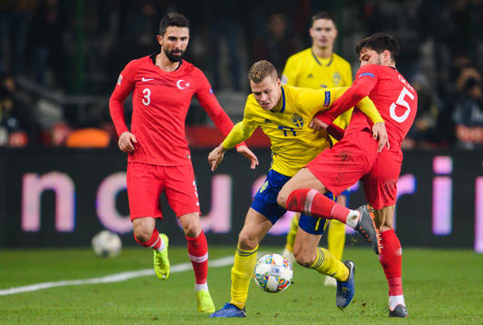 Viktor Claesson of Sweden in a duel with Hasan Ali Kaldirim and Okay Yokuslu of Turkey 