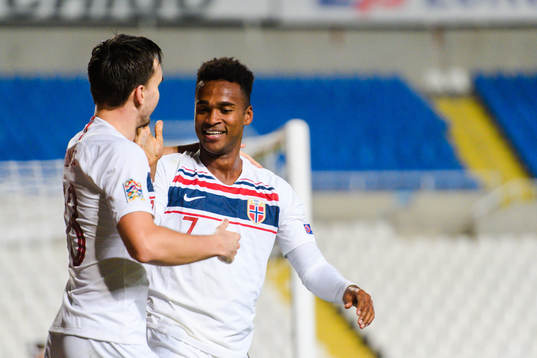 Ole Kristian Selnæs and Ola Kamara of Norway celebrates after 0-2