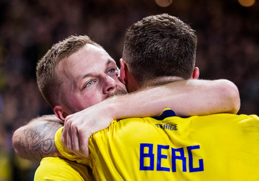 Marcus Berg of Sweden celebrates with his teammate