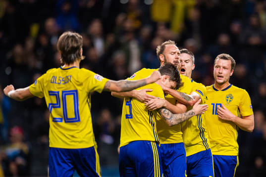 Kristoffer Olsson, Mikael Lustig, Victor Nilsson Lindelöf, Andreas Granqvist and Jakob Johansson of Sweden celebrates after 1-0