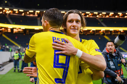 Marcus Berg and Kristoffer Olsson of Sweden celebrates