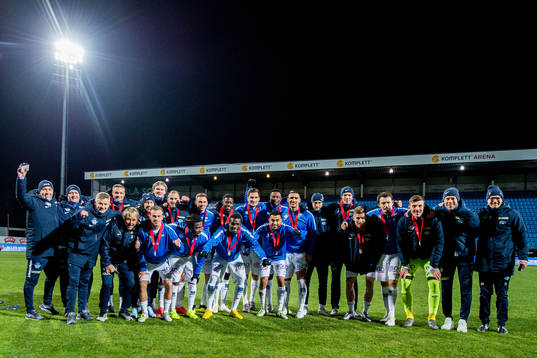 Ole Gunnar Solskjær, manager, Petter Strand, Erling Braut Håland, Eirik Hestad, Daniel Chima Chukwu, Fredrik Aursnes, Isak Ssewankambo, Babacar Sarr, Christoffer Remmer, Etzaz Hussain, Leke Samson James, Ruben Gabrielsen, Magnus Eikrem, Kristoffer Haugen, Vegard Forren, goalkeeper Andreas Linde and staff of Molde celebrate winning silver after the Eliteserien match between Sandefjord and Molde on November 24, 2018 in Sandefjord.
