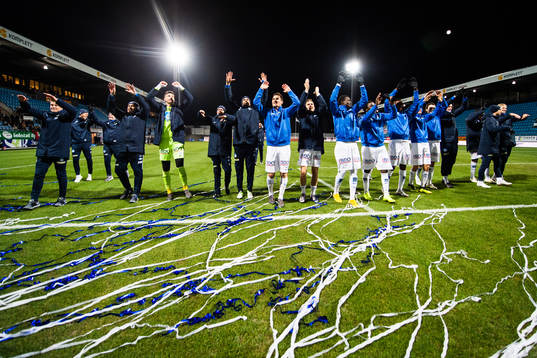Ole Gunnar Solskjær, manager of Molde, goalkeeper Andreas Linde, Kristoffer Haugen, Christoffer Remmer, Daniel Chima Chukwu, Leke Samson James, Vegard Forren and staff celebrate winning silver after the Eliteserien match between Sandefjord and Molde on November 24, 2018 in Sandefjord.
