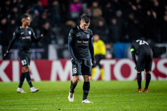 Ruslan Malinovskyi of Genk looks dejected