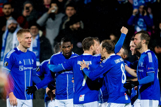 Rashad Muhammed of Sarpsborg 08 celebrates with teammates Ole Jørgen Halvorsen, Matti Lund Nielsen and Patrick Mortensen after scoring 1-0