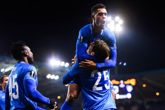 Sander Berge of Genk celebrates with teammates after 3-0