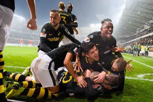 This picture is part of Bildbyrån’s selection of the 100 best sports photos from 2018. Originally published 20181111. Players of AIK celebrate with Robin Jansson who scored the match-winning goal and the Swedish Championship title to AIK