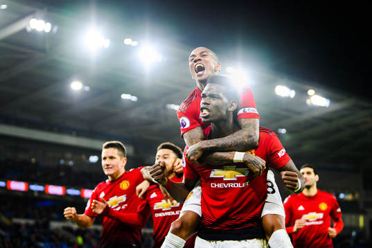Paul Pogba and Ashley Young of Manchester United celebrate
