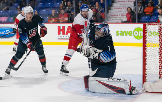 Goalie Kyle Keyser #1 of the United States makes a save