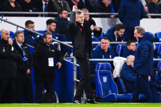Ole Gunnar Solskjær, manager of Manchester United, celebrates after 0-2