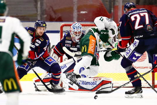 Linköpings Chad Billins och målvakt Jonas Gustavsson