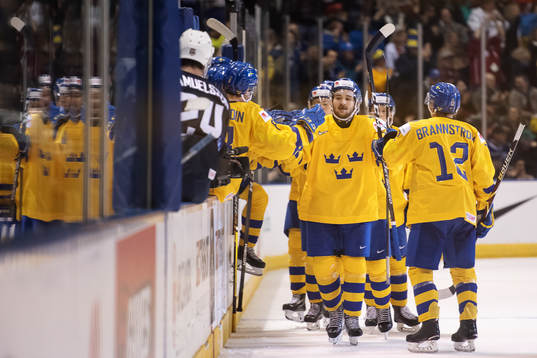 Emil Bemström of Sweden celebrates with teammates