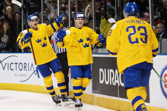 Jacob Olofsson, Adam Boqvist and Lucas Elvenes of Sweden