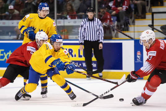Erik Brännström of Sweden in action against Nicolas