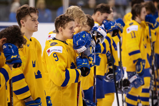 Nils Lundkvist of Sweden and his teammates look dejected
