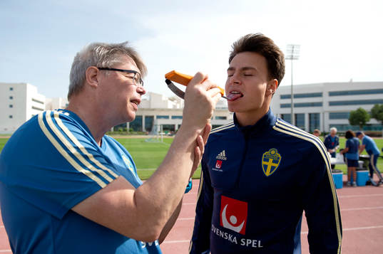Sweden's Melker Hallberg gets a saliva test by Dale Reese
