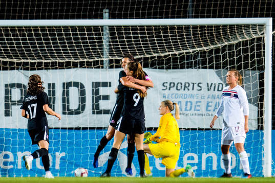 Christine Sinclair of Canada celebrates after scoring 0-1