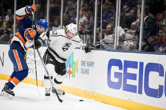 Devon Toews of New York Islanders and Carl Hagelin of Los