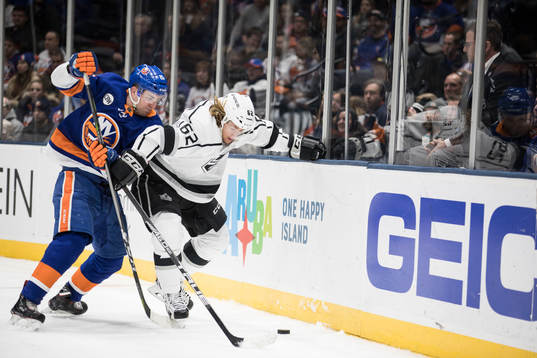 Devon Toews of New York Islanders and Carl Hagelin of Los