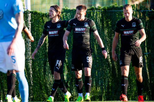 Kristoffer Olsson, Sergei Petrov and Viktor Claesson of Krasnodar celebrates after 1-0