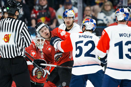 Patrick Hager of Red Bull Munich fights Mats Rosseli Olsen