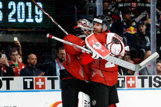 goalkeeper Johan Gustafsson and Joel Lundqvist of Frölunda