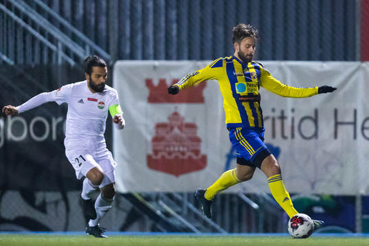 Eskilsminnes Jonatan Olsson och Dalkurds Peshraw Azizi