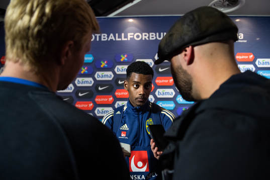 Alexander Isak of Sweden talks to the media