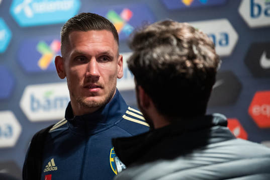 goalkeeper Robin Olsen of Sweden talks to the media in the mixed zone
