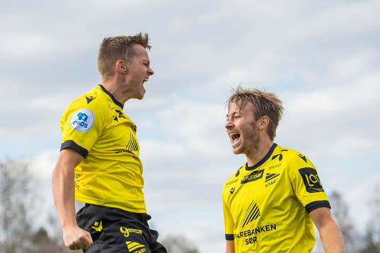 Aron Sigurdarson of Start celebrates with Henrik Robstad after scoring 0-1
